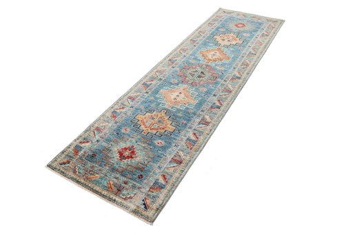 Corner detail of New Kazak rug showing border pattern and Wool pile