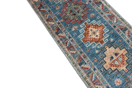 Backside of handmade New Kazak rug showing knot structure and weave density