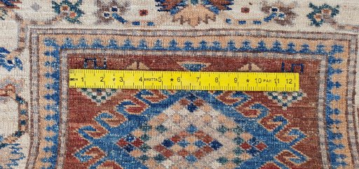 Close-up detail of New Kazak rug from Pakistan showing Wool weave