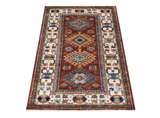 Corner detail of New Kazak rug showing border pattern and Wool pile
