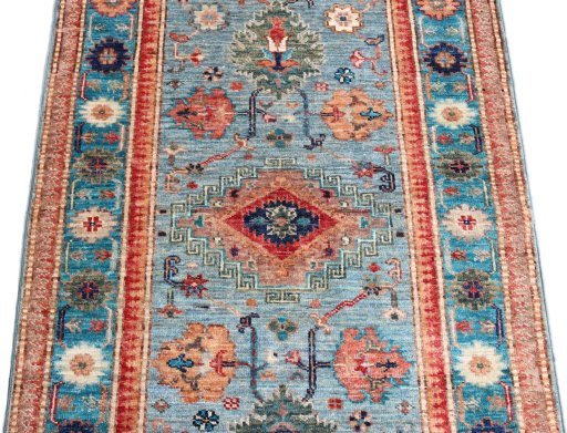Close-up detail of New Kazak rug from Pakistan showing Wool weave