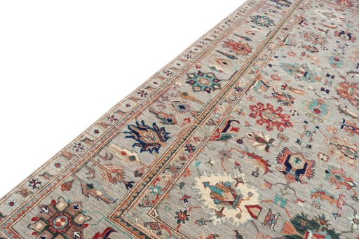 Backside of handmade New Kazak rug showing knot structure and weave density
