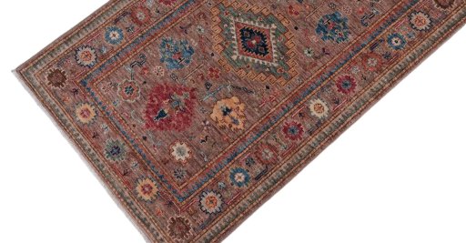 Backside of handmade New Kazak rug showing knot structure and weave density