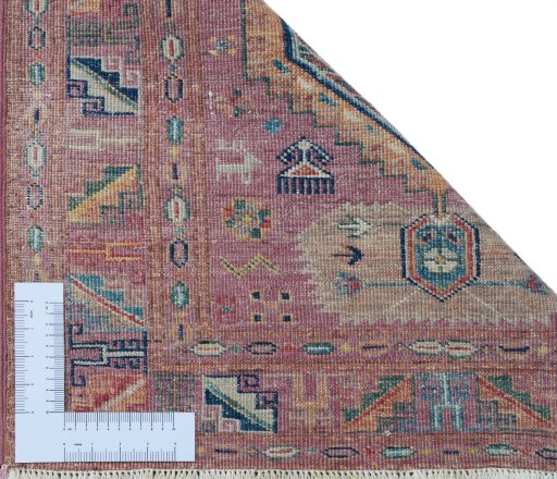 Corner detail of New Kazak rug showing border pattern and Wool pile