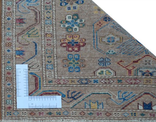 Corner detail of New Kazak rug showing border pattern and Wool pile