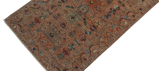 Backside of handmade New Kazak rug showing knot structure and weave density