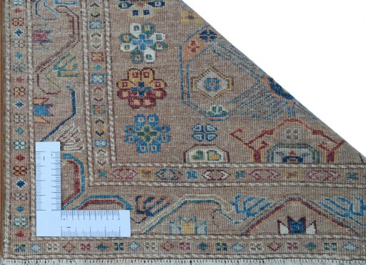 Corner detail of New Kazak rug showing border pattern and Wool pile