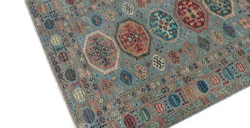 Backside of handmade New Kazak rug showing knot structure and weave density