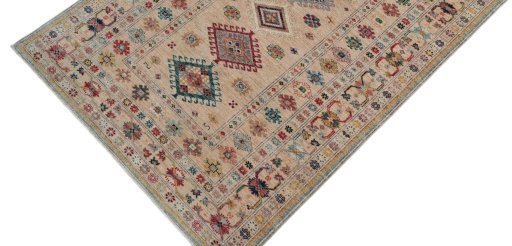 Backside of handmade New Kazak rug showing knot structure and weave density