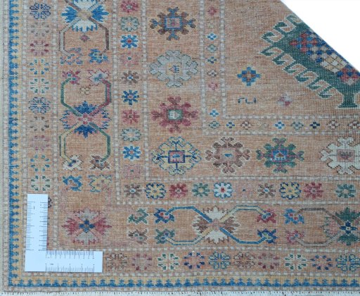 Corner detail of New Kazak rug showing border pattern and Wool pile