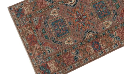 Backside of handmade New Kazak rug showing knot structure and weave density