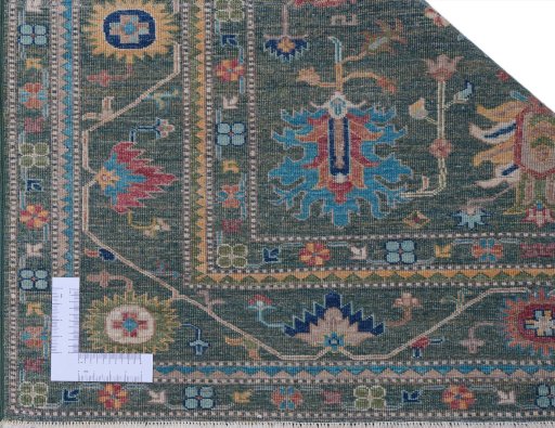 Corner detail of New Kazak rug showing border pattern and Wool pile
