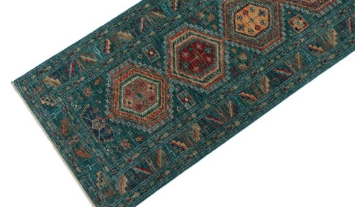Backside of handmade New Kazak rug showing knot structure and weave density