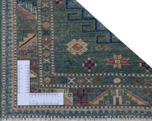 Corner detail of New Kazak rug showing border pattern and Wool pile