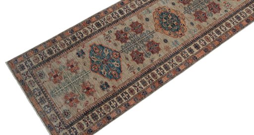 Backside of handmade New Kazak rug showing knot structure and weave density