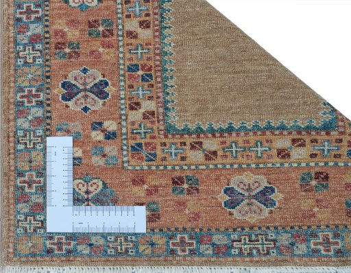 Corner detail of New Kazak rug showing border pattern and Wool pile