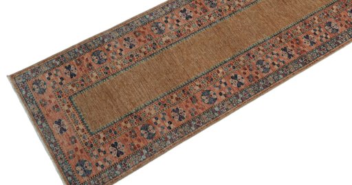Backside of handmade New Kazak rug showing knot structure and weave density