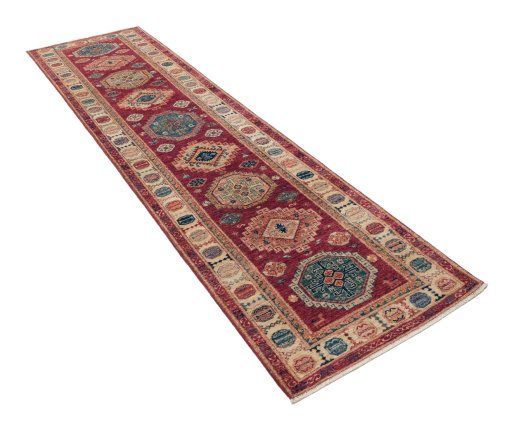 Corner detail of New Kazak rug showing border pattern and Wool pile