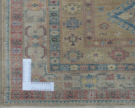 Corner detail of New Kazak rug showing border pattern and Wool pile