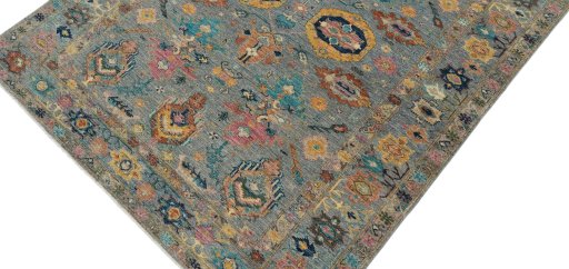 Backside of handmade New Kazak rug showing knot structure and weave density