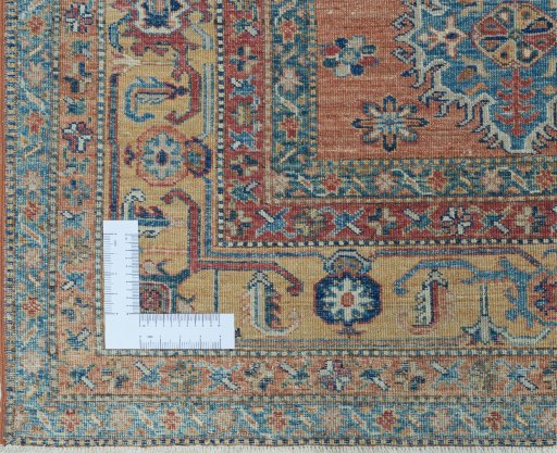 Corner detail of New Kazak rug showing border pattern and Wool pile