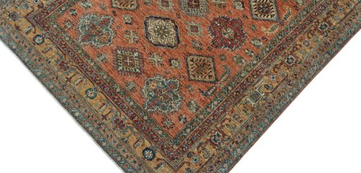 Backside of handmade New Kazak rug showing knot structure and weave density