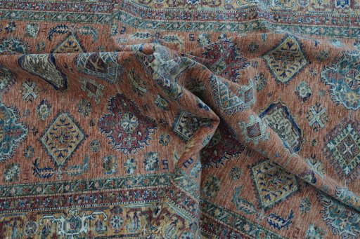 Full view of New Kazak rug from Pakistan, 293 × 196 cm in Yellow tones