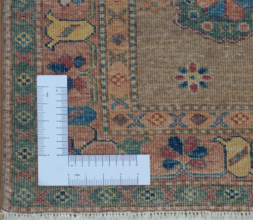 Corner detail of New Kazak rug showing border pattern and Wool pile
