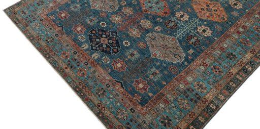 Backside of handmade New Kazak rug showing knot structure and weave density