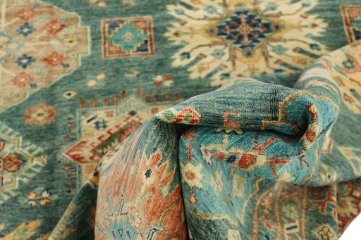 Backside of handmade New Kazak rug showing knot structure and weave density