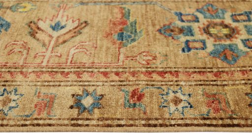Corner detail of New Kazak rug showing border pattern and Wool pile