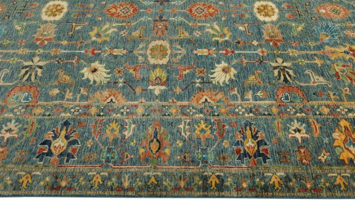 Full view of New Kazak rug from Pakistan, 310 × 247 cm in Blue tones