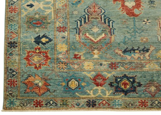 Corner detail of New Kazak rug showing border pattern and Wool pile