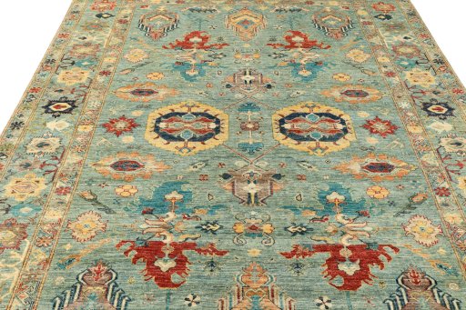 Backside of handmade New Kazak rug showing knot structure and weave density