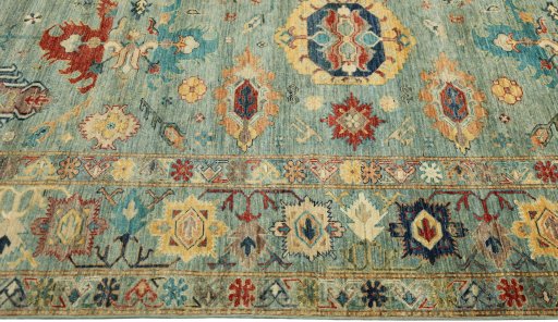 Full view of New Kazak rug from Pakistan, 297 × 244 cm in Blue tones