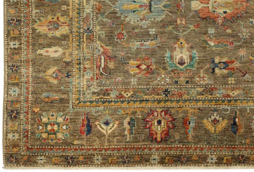 Corner detail of New Kazak rug showing border pattern and Wool pile