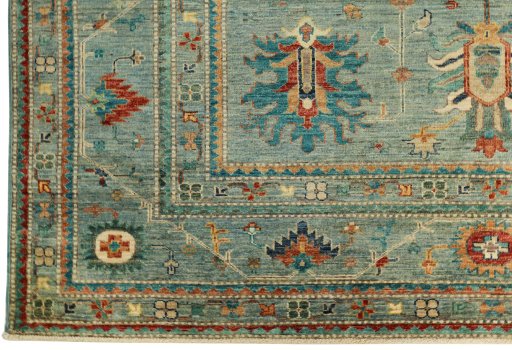 Corner detail of New Kazak rug showing border pattern and Wool pile