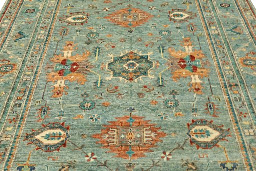 Backside of handmade New Kazak rug showing knot structure and weave density