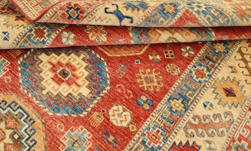 Corner detail of New Kazak rug showing border pattern and Wool pile