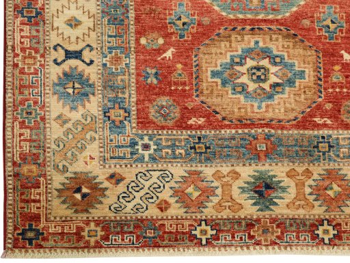 Full view of New Kazak rug from Pakistan, 186 × 123 cm in Red tones