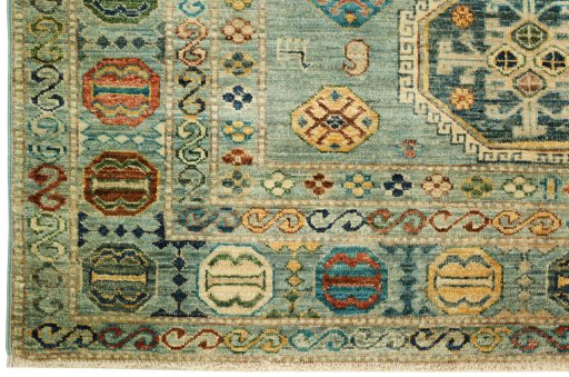 Corner detail of New Kazak rug showing border pattern and Wool pile