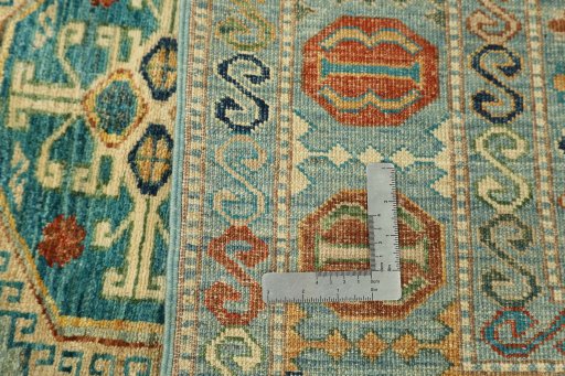 Surface texture of New Kazak rug with natural Wool and intricate pattern
