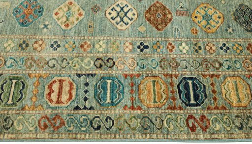 Full view of New Kazak rug from Pakistan, 203 × 147 cm in Blue tones