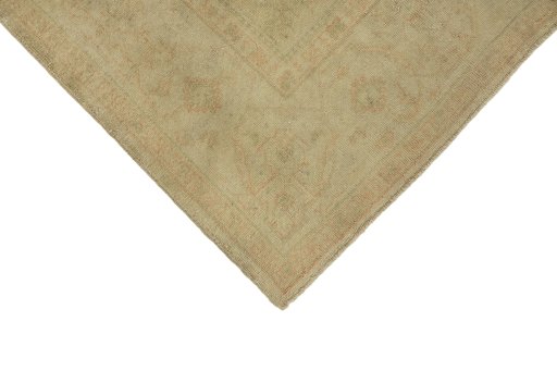 Backside of handmade 1900s Oushak rug showing knot structure and weave density