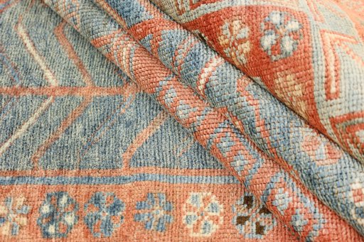 Corner detail of 1920s Oushak rug showing border pattern and Wool pile