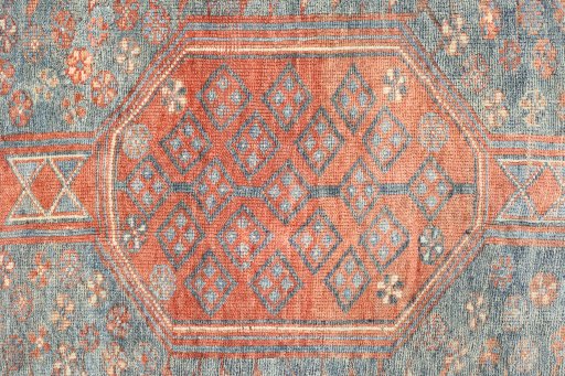 Central medallion detail of 1920s Oushak rug from Turkey