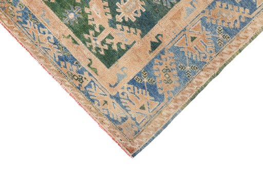 Backside of handmade 1920s Oushak rug showing knot structure and weave density