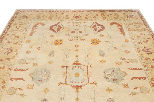 Backside of handmade 1990s Oushak rug showing knot structure and weave density