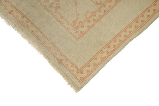 Backside of handmade 1920s Oushak rug showing knot structure and weave density