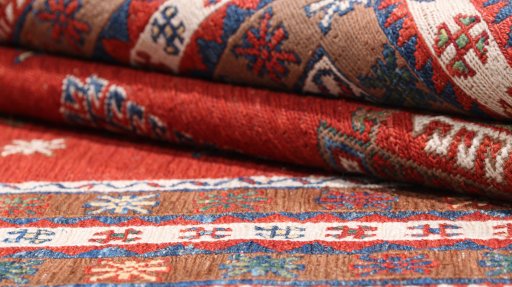 Close-up detail of New Sumakh rug from Iran / Persia showing Wool weave